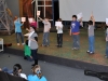 4th and 5th graders work together to put the story of Rahab in order during chapel.
